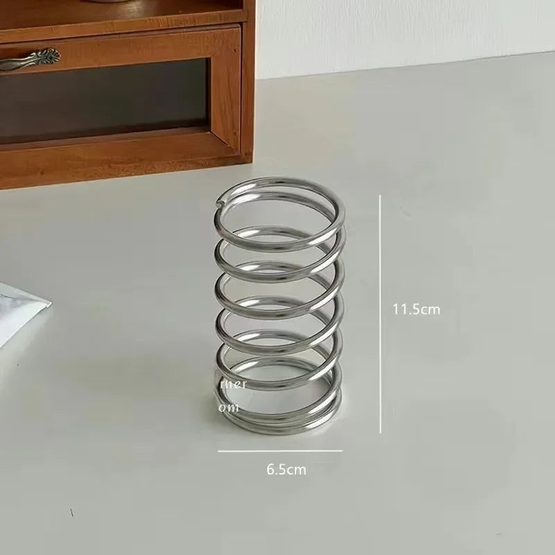 Porta-canetas espiral em aço inoxidável